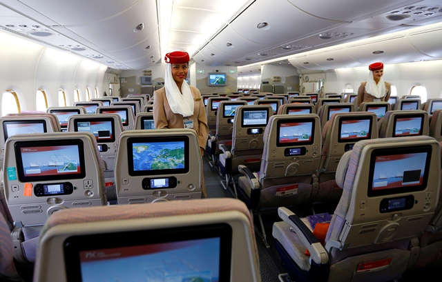 Economy class seats are pictured inside an Emirates Airbus A380 after the first landing of the plane in Frankfurt's airport, September 1, 2014. REUTERS/Kai Pfaffenbach (GERMANY - Tags: TRANSPORT BUSINESS TRAVEL) - RTR44JJW